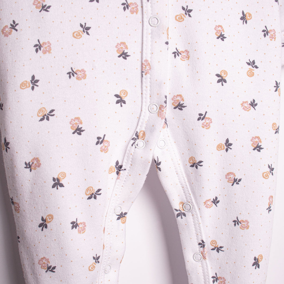 220031 Pajac niemowlęcy Nicol bawełna 100% w kwiatki z napami