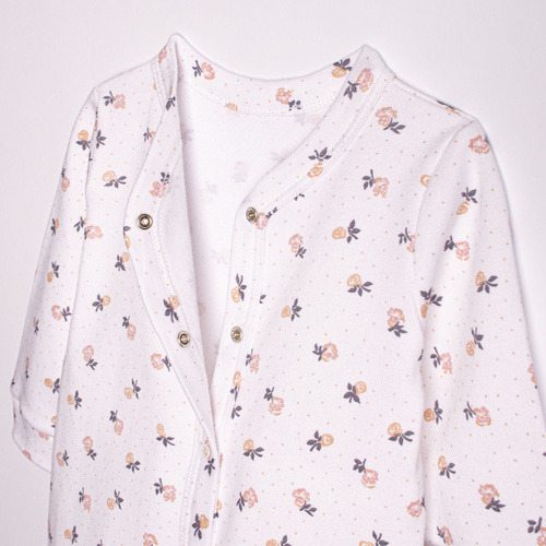 220032 Pajac niemowlęcy Nicol 100% bawełna z długim rękawem i drobnym nadrukiem kwiatowym