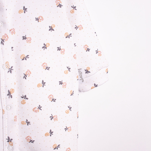 220032 Pajac niemowlęcy Nicol 100% bawełna z długim rękawem i drobnym nadrukiem kwiatowym