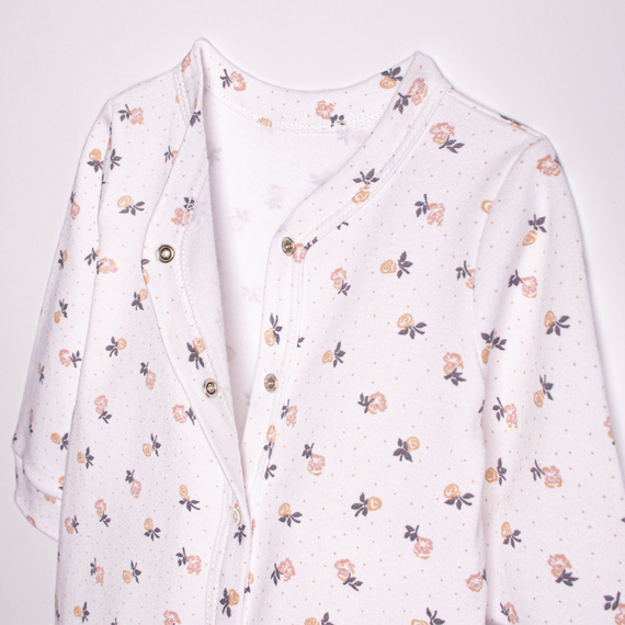 220032 Pajac niemowlęcy Nicol 100% bawełna z długim rękawem i drobnym nadrukiem kwiatowym