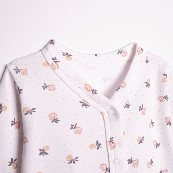 220031 Pajac niemowlęcy Nicol bawełna 100% w kwiatki z napami