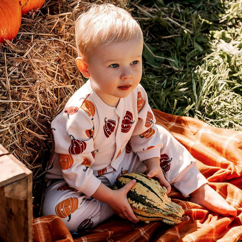 Pajac dziecięcy Eevi Halloween – ecru, dynie, bez stópek, bawełna