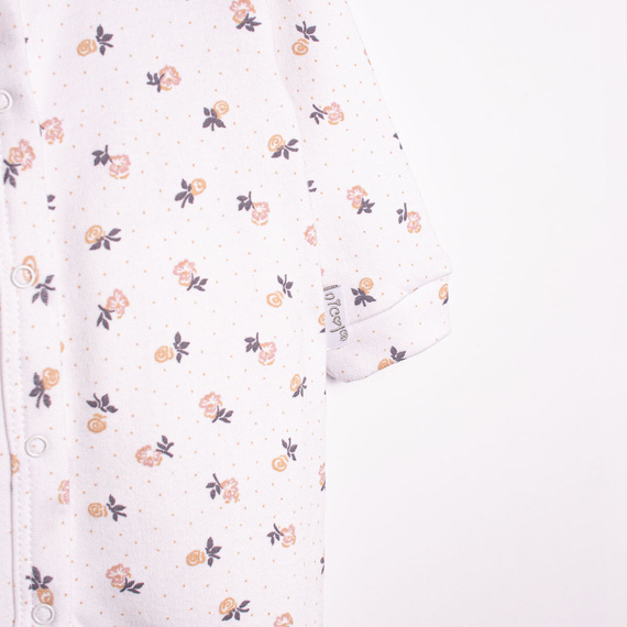220032 Pajac niemowlęcy Nicol 100% bawełna z długim rękawem i drobnym nadrukiem kwiatowym