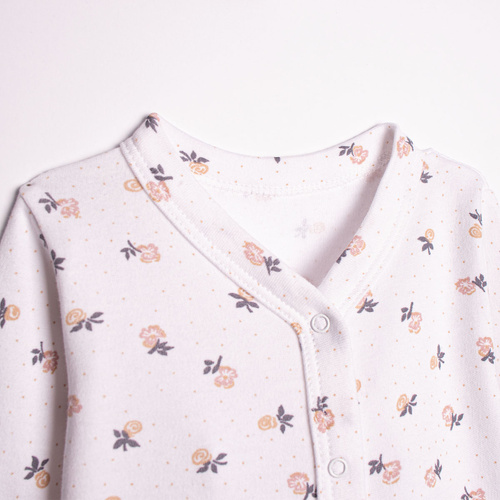 220031 Pajac niemowlęcy Nicol bawełna 100% w kwiatki z napami